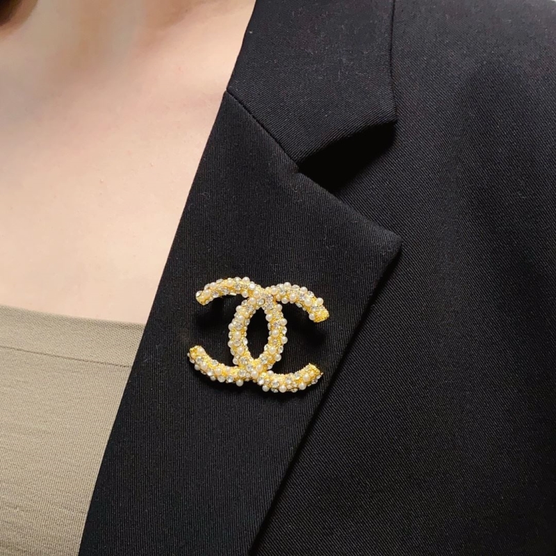 Ch**el brooches